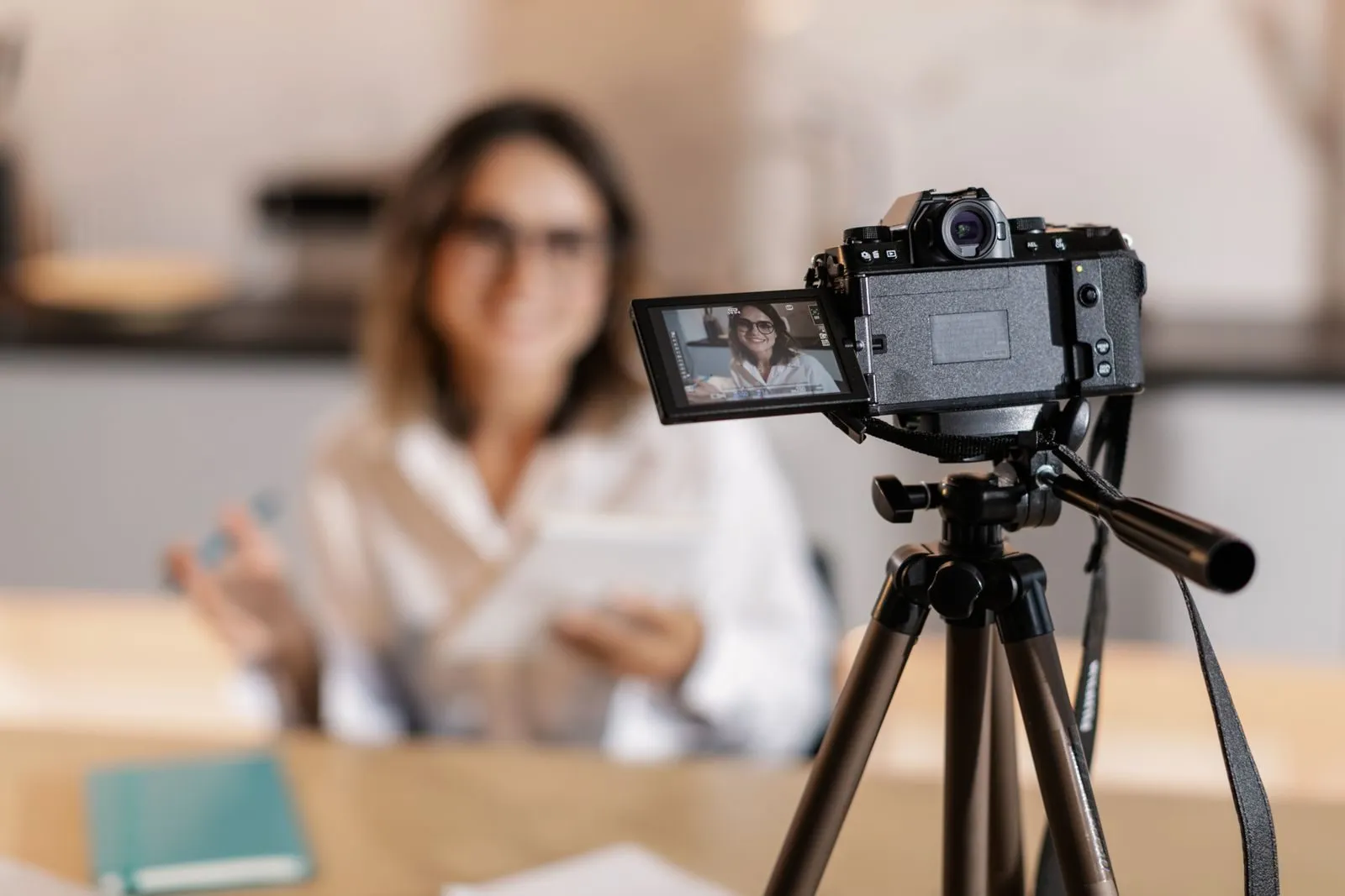 Content creator reviewing a shot on camera